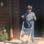 Jason pushing Justin in the stroller in 1986 in front of the cabins when his grandparents managed the business.