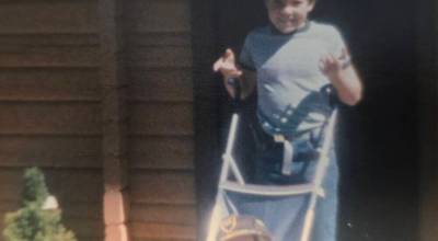 Jason pushing Justin in the stroller in 1986 in front of the cabins when his grandparents managed the business.