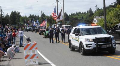 Photos by Lonnie Archibald
The Fun Days parade began with the Clallam County Sheriff, USCG Neah Bay color guard, and honored veterans leading the way.
