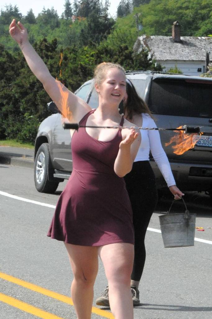 Rainee Signor was playing with fire as she twirled her flame-lit baton.